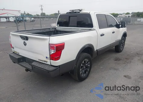 2019 Nissan Titan Pro-4X из США, поврежденный, VIN 1N6AA1E57KN504186